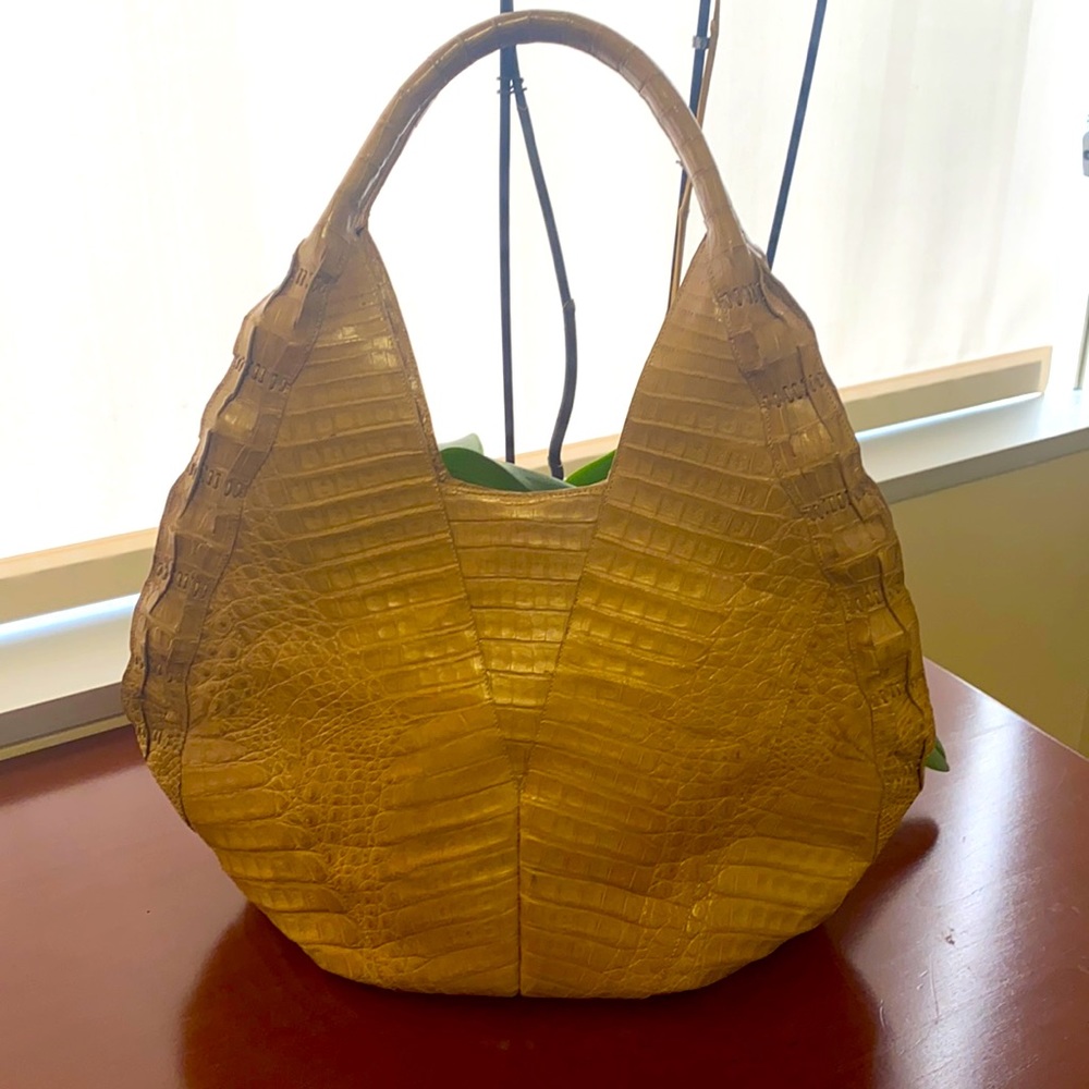 Nancy Gonzalez crocodile camel color handbag.
